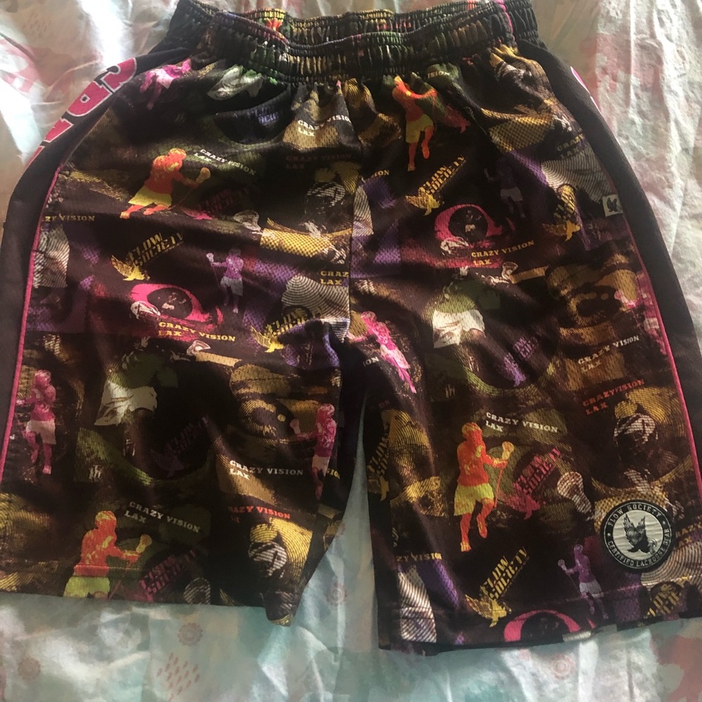 Well loved. Still cute lacrosse shorts.
